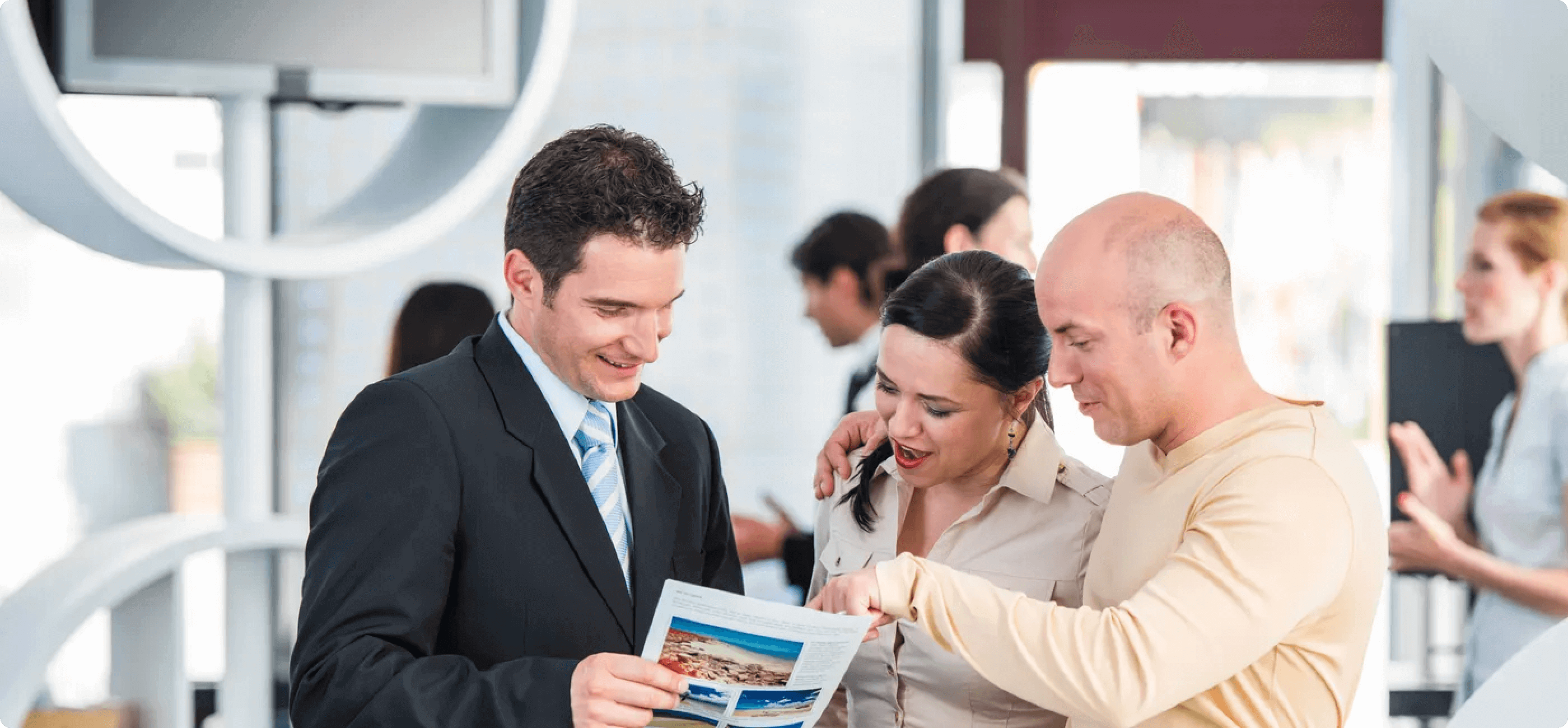 Business people discussing travel documents
